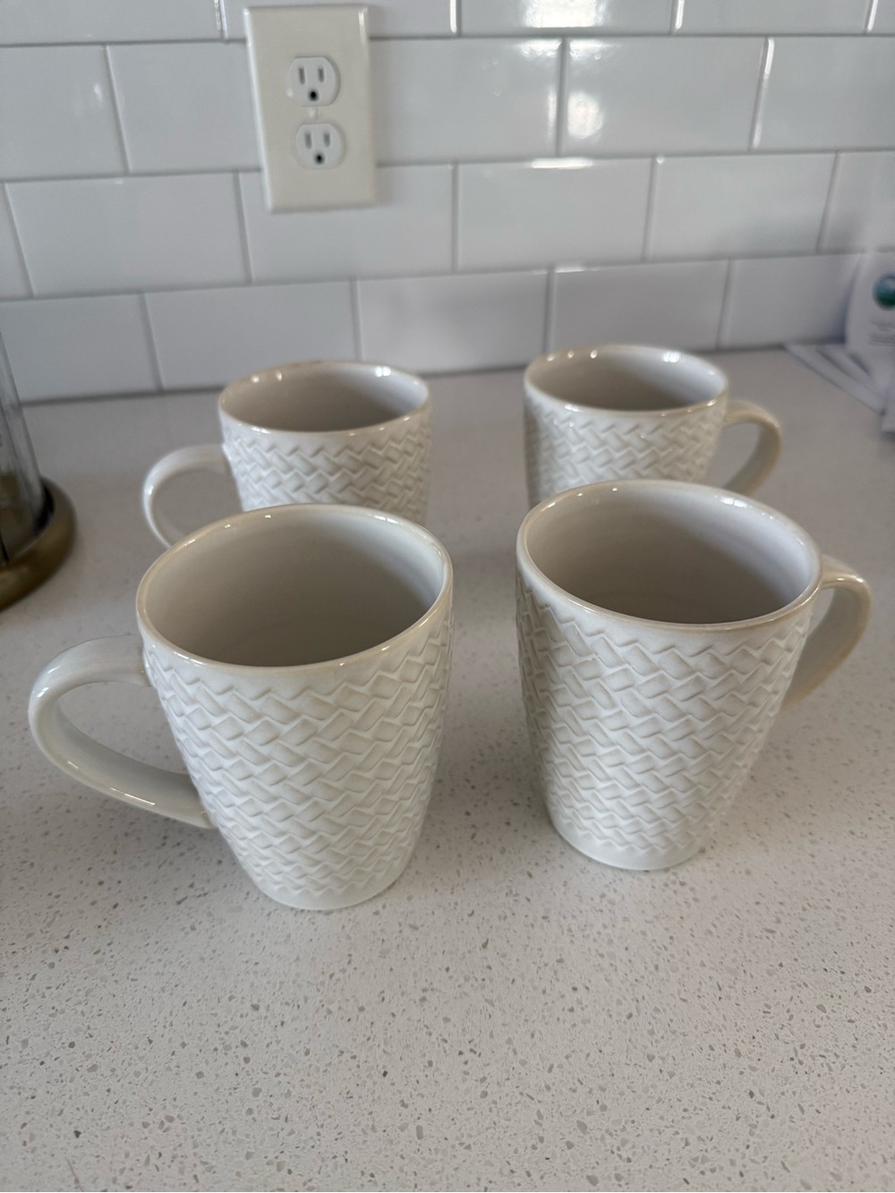 4 white basketweave Crate and Barrel mugs